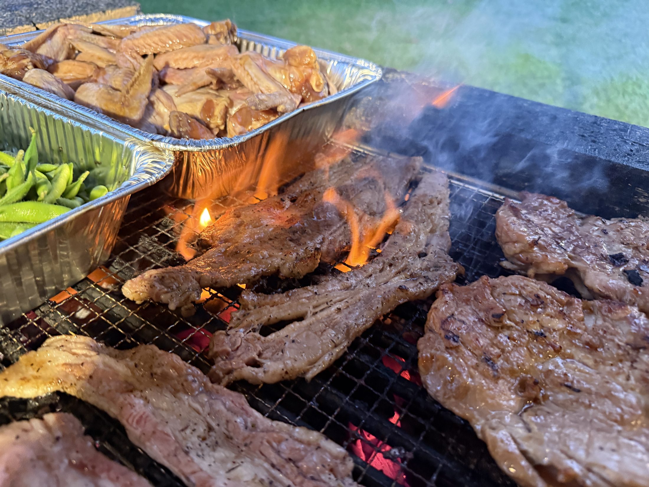 Wagyu steaks and herbed lamb chops on the grill